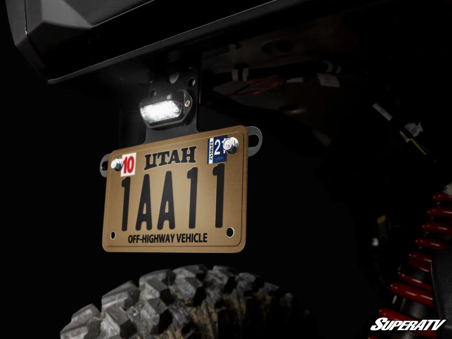 UNIVERSAL LIGHTED LICENSE PLATE HOLDER